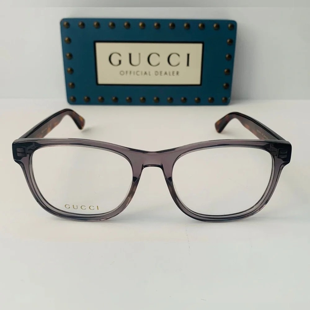 Gucci's GG0004ON features soft lines frames acetate front. Iconic web effect